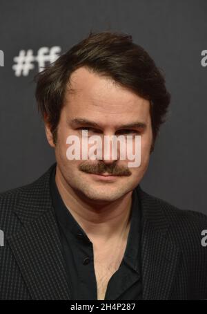 Cologne, Germany. 25th Oct, 2021. Actor Philipp Hauss comes to the screening of the film Monte Verita - The Intoxication of Freedom at the Film Festival Cologne. Credit: Horst Galuschka/dpa/Alamy Live News Stock Photo