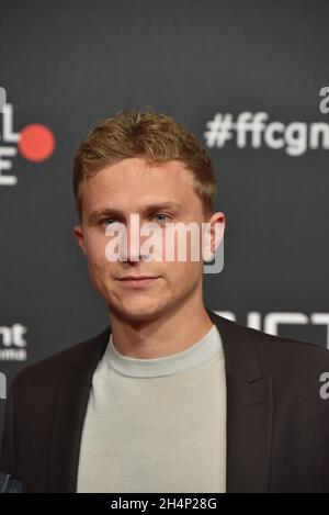 Cologne, Germany. 25th Oct, 2021. Actor Max Hubacher comes to the screening of the film Monte Verita - The Intoxication of Freedom at the Film Festival Cologne. Credit: Horst Galuschka/dpa/Alamy Live News Stock Photo