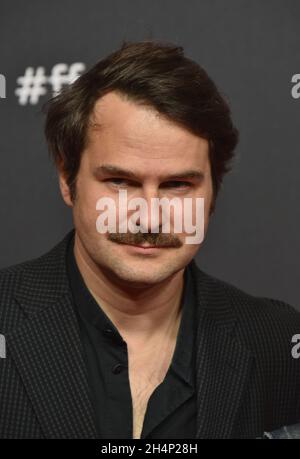 Cologne, Germany. 25th Oct, 2021. Actor Philipp Hauss comes to the screening of the film Monte Verita - The Intoxication of Freedom at the Film Festival Cologne. Credit: Horst Galuschka/dpa/Alamy Live News Stock Photo