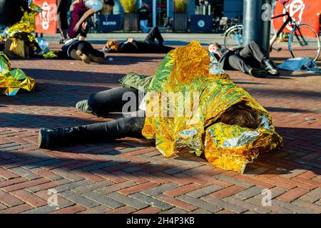 Rotterdam, Netherlands. Action, Protest and Die-In by Young People against Climate Change and the inabillity of governments to take nessesary measures. Stock Photo