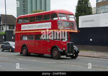 A preserved former London Transport AEC RT bus RT 1702 passed through Alperton on its way to a bus garage open day. Stock Photo