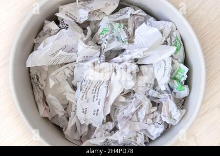 Cash sales check sorted for recycling. Cashier's receipts for recycle. Waste to be recycled. Stock Photo