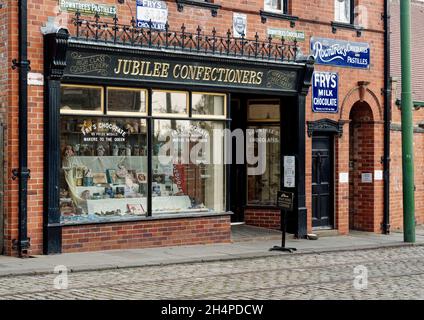Shop buildings in the wonderful 1900's town at Beamish Museum - confectioners shopfront. Stock Photo