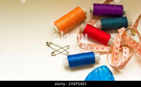 Composition With Tailor Needles And Threads Over White Background Stock  Photo, Picture and Royalty Free Image. Image 27141969.
