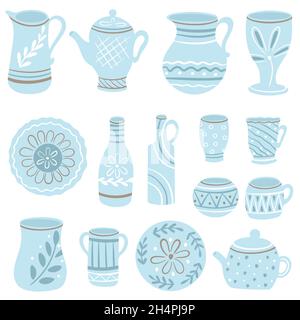 Set of Blue Kitchen Utensils in a Ceramic Cup and Plates Stock