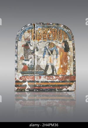 Ancient Egyptian stele the lady Nestarout led by the god Thoth before the god Atoum, circa 900 BC, 3rd Intermediate Period, painted wood. The Louvre M Stock Photo