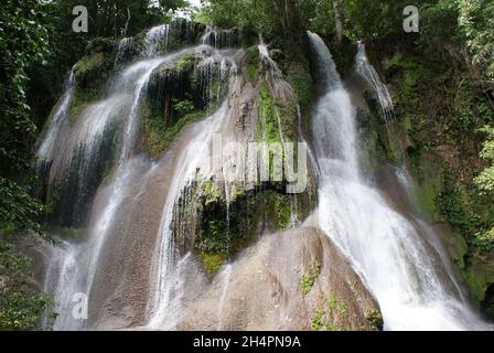 Beautiful shot of a waterfall in the middle of a forest in Bonito, Brazil Stock Photo
