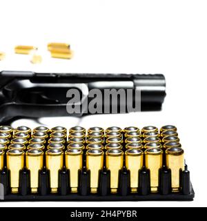 Cartridges and bullets for traumatic weapons. A lot of cartridges for a traumatic gun on a white background at the bottom of the photo Stock Photo