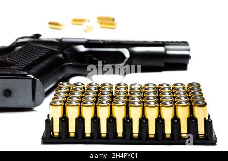 Cartridges and bullets for traumatic weapons. A lot of cartridges for a traumatic gun on a white background at the bottom of the photo Stock Photo