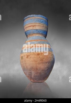 Anient Egyptian decorated terracotta vase amphora, 1327-1068, 18th dynasty, El-Arba el-Madfouna. Louvre Museum E 21838. decorated with bands.  Height: Stock Photo