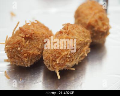 Chicken chop, Kerala South India. hot and spicy tea time snack on metal plate, plate background Stock Photo