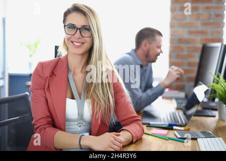 Smiling and professional company worker Stock Photo