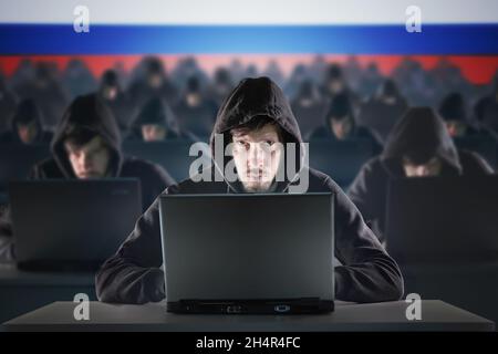 Many hackers in russian troll farm. Security and privacy concept. Stock Photo