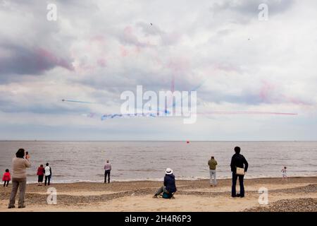 RAF Red Arrows display over Great Yarmouth beach at the resort's first Airshow in 2018. Stock Photo