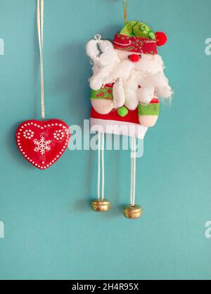 Christmas decor. Santa handmade and ceramic heart. Stock Photo