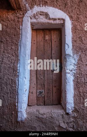 Old door in the Ksar of Taghit Stock Photo