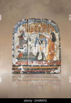 Ancient Egyptian stele the lady Nestarout led by the god Thoth before the god Atoum, circa 900 BC, 3rd Intermediate Period, painted wood. The Louvre M Stock Photo