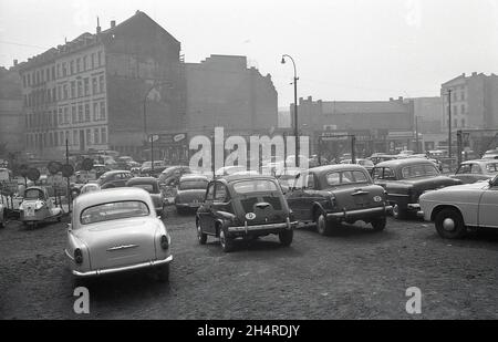 1960s, historical, in an area of a town, possibly Frankfurt, Germany, cars parked in a second-hand car lot, most with the German D sticker (Deutschland) on and without numberplates. Stock Photo
