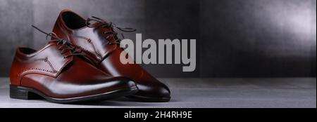 Composition with a pair of man's shoes. Stock Photo