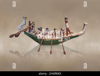 Wooden Egyptian wood boat model, circa 2000 BC, middle Empire. Louvre Museum E 12027. As with other model types, tomb wall paintings from the Old King Stock Photo