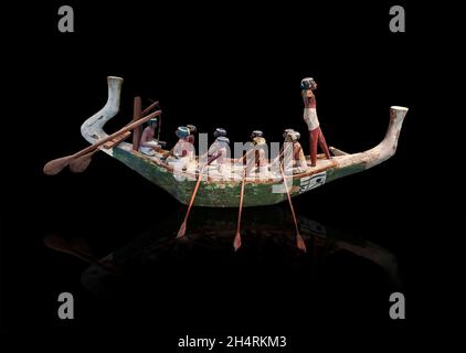 Wooden Egyptian wood boat model, circa 2000 BC, middle Empire. Louvre Museum E 12027. As with other model types, tomb wall paintings from the Old King Stock Photo