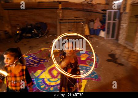 Members of Hindu Community are celebrating Diwali Festival held at Sawami Narain Temple in Karachi on Thursday, November 04, 2021. Pakistani Hindus are celebrating Diwali also known as Deepavali or the festival of lights across the country with zeal and fervour, with families decorating their houses and temples with colourful lights. Stock Photo