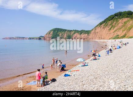 Sidmouth Devon Families on the beach at Jacobs Ladder beach under Peak Hill Sidmouth Town Sidmouth Devon England UK GB Europe Stock Photo