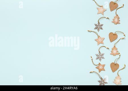 Winter Christmas concept. Wooden decorations. Border flat lay copy space top view. Stock Photo