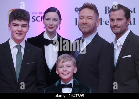 (left to right) Lewis McAskie, Caitriona Balfe, Kenneth Branagh and Jamie Dornan with Jude Hill in front as they attend the Irish premiere of film Belfast at the Waterfront Hall, Belfast, to mark the opening night of the Belfast Film Festival. Picture date: Thursday November 4, 2021. Stock Photo