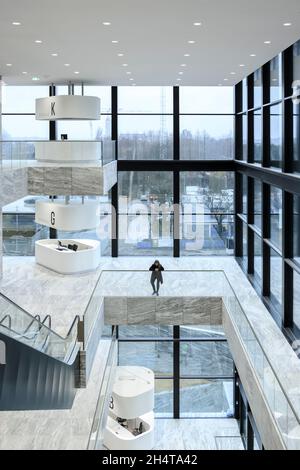 Multi level interior atrium view. Courthouse Amsterdam, Amsterdam, Netherlands. Architect: KAAN, 2021. Stock Photo