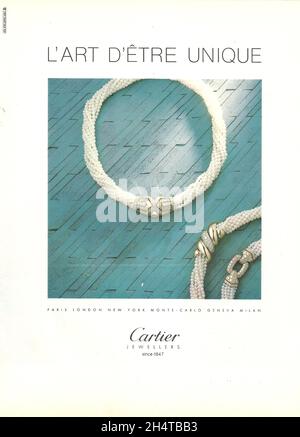 Cartier jewellery jewelry advertisement advert necklace necklet bracelet paper ad 1970s 1980s Stock Photo