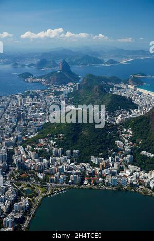 Rodrigo de Freitas Lagoon, and Sugar Loaf in distance, Rio de Janeiro, Brazil, South America - aerial Stock Photo