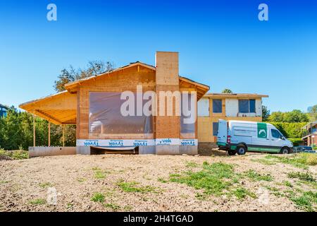 Whole house is being fully renovated and a new wing addition is under construction . Stock Photo