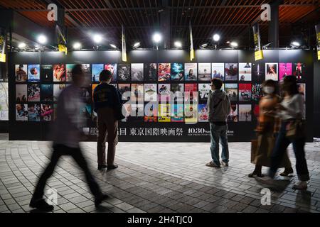 Tokyo, Japan. 4th Nov, 2021. People look at films being showcased during the 34th Tokyo International Film Festival which is held from October 30 to November 8. Credit: AFLO/Alamy Live News Stock Photo