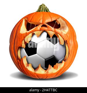 Soccer autumn concept as a pumpkin jack o lantern biting into a leather ball as a symbol for halloween sports and fall sporting events. Stock Photo