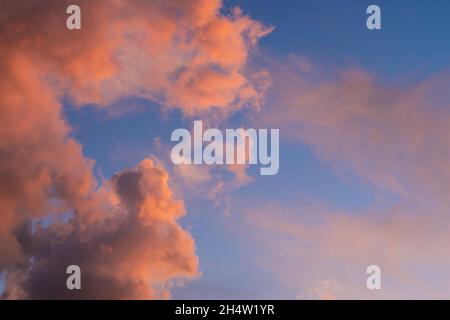 Beautiful pastel cloudy sunset sky. Pink and blue magic dreamlike evening sky Stock Photo