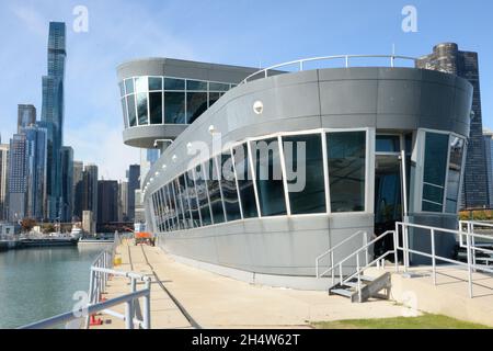 A View of the Lock observation building and the Chicago skyline from the east gate of the Chicago Harbor Lock on a brisk November morning during the Lock's off-season. Stock Photo