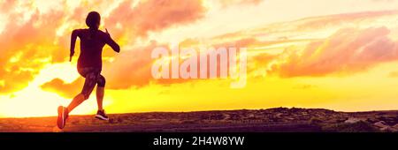 Run sport athlete running in sunset - Silhouette of fitness girl jogging on trail road with orange sky background. Fit woman exercise lifestyle Stock Photo