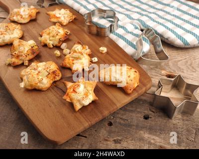 Spicy Christmas pastry in tarte flambée style, creative Christmas cuisine, Christmas bakery Stock Photo