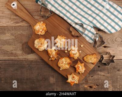 Spicy Christmas pastry in tarte flambée style, creative Christmas cuisine, Christmas bakery Stock Photo