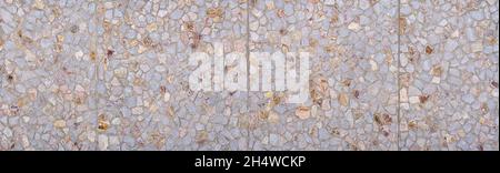 Stone wall made of big square, industrially manufactured elements Stock Photo