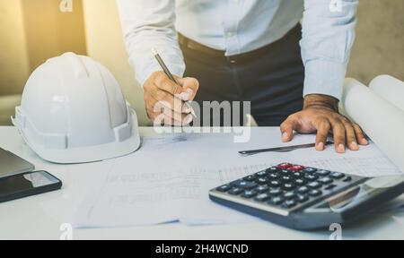 Engineer or architects working planning project on desk. Stock Photo