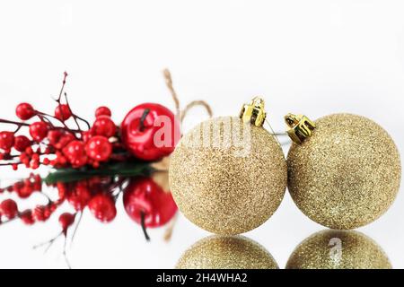 Christmas composition. Flat lay, top view. Disco ball bauble, star  sparkles. Minimal New year party concept. Christmas white and gold  decorations on green background with copy space. Photograph by Yuliia  Chyzhevska 