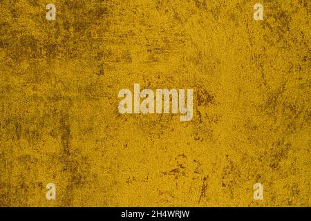 background of yellow-painted scratched grunge surface texture Stock Photo