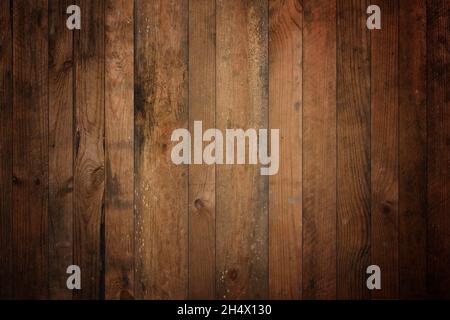 Dark old barn wood background texture. Vintage weathered rough planks backdrop. Stock Photo