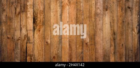 Old barn wood background texture. Vintage weathered rough planks wall backdrop. Stock Photo