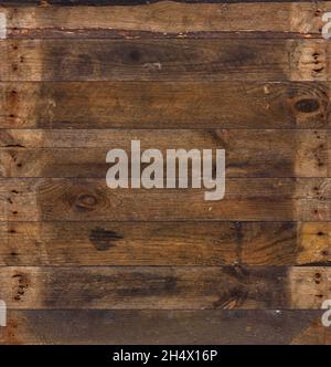 Old barn wood background texture. Vintage weathered rough planks with rusty nails. Stock Photo