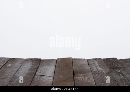 Wooden table from old planks, empty for your product, with neutral gray background Stock Photo