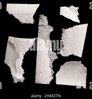 White torn napkin on black background Stock Photo