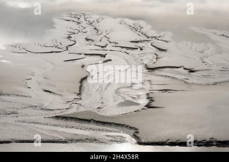 Patterns in the mud of Morecambe Bay near Far Arnside in Cumbria Stock Photo